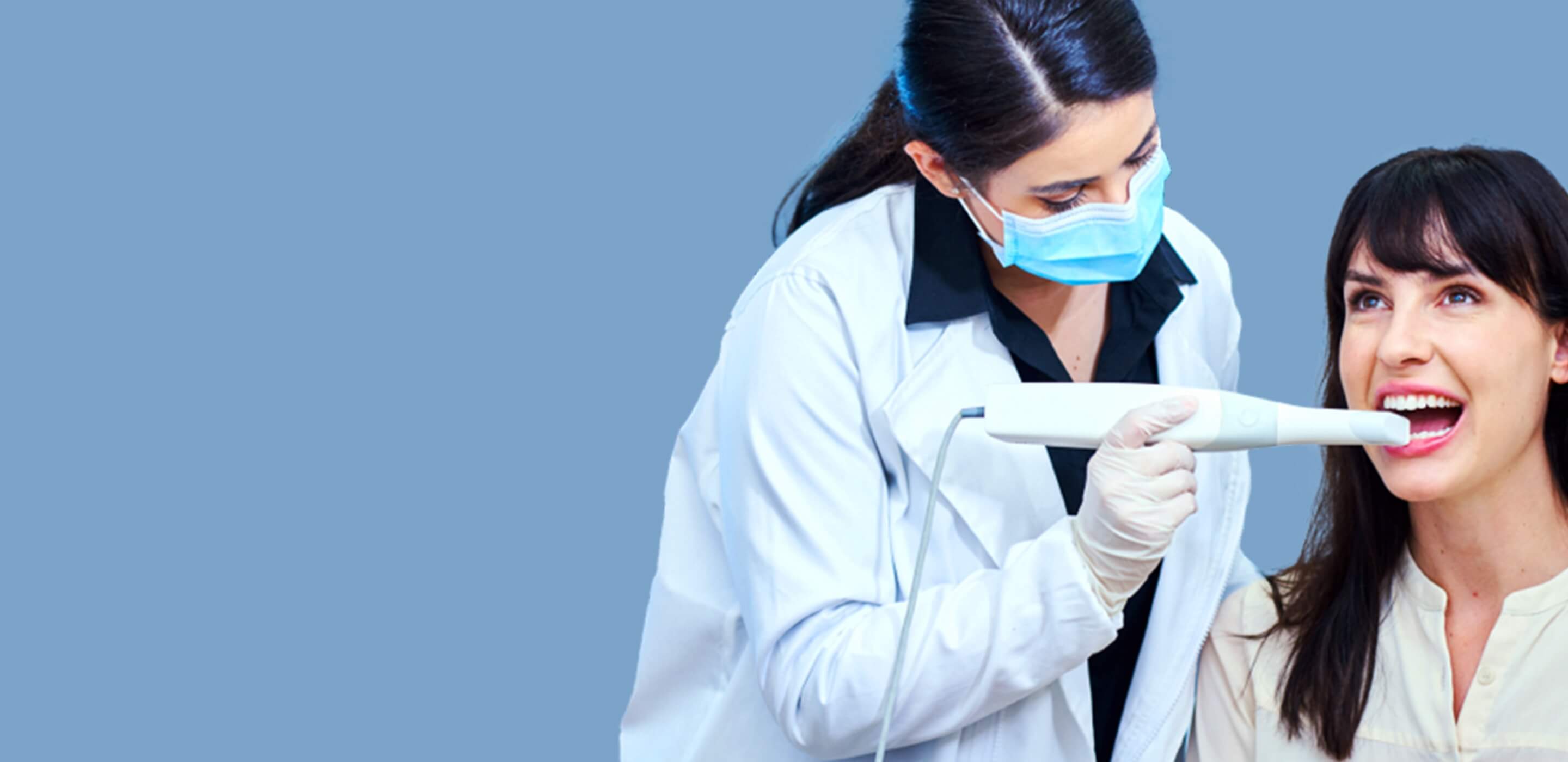 Patient receiving a 3D dental scan from a clinician as part of clear aligner treatment planning.